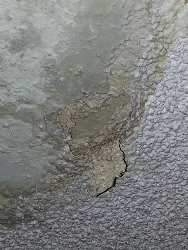 water leak damage in a home in the ceiling